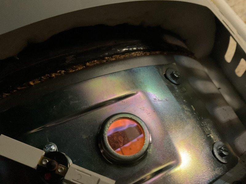 Responded to third service call for pilot light failure on State Industries automatic storage water heater. Gas valve was previously replaced during first visit, and pilot was re-lit with gas valve inspection performed on second visit. Upon arrival, found pilot light extinguished again. Conducted comprehensive diagnostic of gas control system, thermocouple, and pilot assembly. Evidence of heat discoloration observed on burner assembly components, indicating potential thermal cycling issues. Re-established pilot flame and verified proper operation of flame sensor and gas valve. Given recurring nature of pilot outages despite gas valve replacement, recommended monitoring unit closely and considering full replacement if issue persists, as repeated pilot failures may indicate underlying combustion chamber or venting problems beyond gas control components.