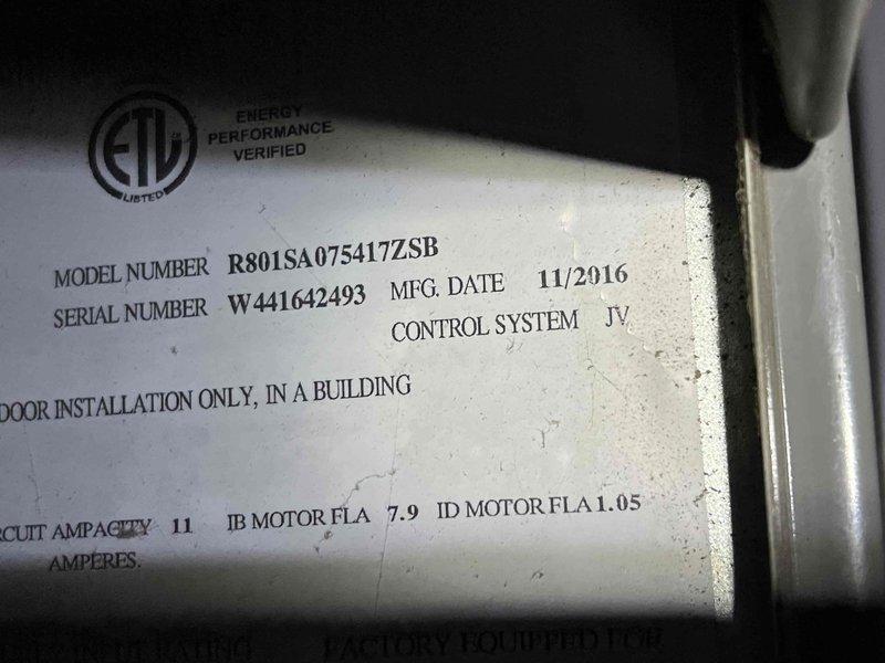 Completed comprehensive city certification inspection on a 9-year-old furnace system (Model R801SA075417ZSB, manufactured 11/2016) located in utility closet. Performed full system tune-up including combustion analysis which revealed proper operation with O2 at 6.9%, CO at 32 ppm, efficiency at 82.3%, CO2 at 7.9%, and stack temperature at 351°F. Inspected and evaluated humidifier, thermostat, and hot water tank as part of rental property certification requirements, with all components functioning within acceptable parameters and system tagged accordingly for city compliance.