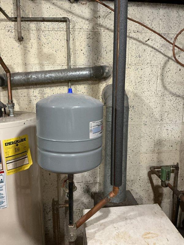 Conducted on-site assessment for new SpacePak/Unico high-velocity HVAC system installation in residential property. Evaluated attic and basement spaces for equipment placement and ductwork routing. Documented existing mechanical infrastructure including water heater, expansion tank, and current piping configurations to determine optimal installation approach for the high-velocity system components.