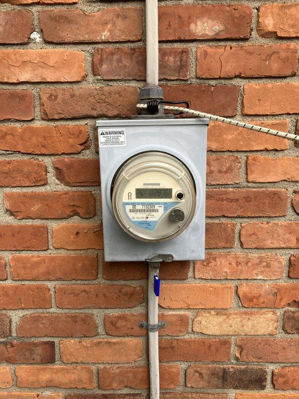 Completed full HVAC system installation including 70,000 BTU furnace, hot water heater, and humidifier with all necessary mechanical, electrical, and plumbing permits. Installed Honeywell ProSeries digital thermostat for system control and reconnected electrical service at exterior meter with disconnect switch. System tested and operational, with utility rebate documentation submitted.