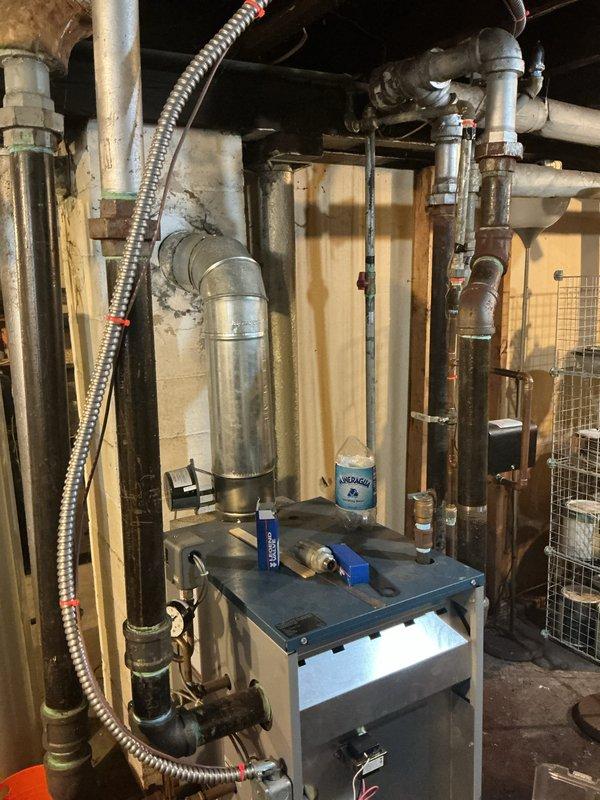 Completed comprehensive tune-up and maintenance on a 12-year-old Utica steam boiler, model PEG150EID. Performed full system inspection including heat exchanger examination, cleaned and inspected burner assembly, checked all safety controls and operating pressures, tested ignition system, and verified proper venting. System found operating within normal parameters with no deficiencies noted at time of service.