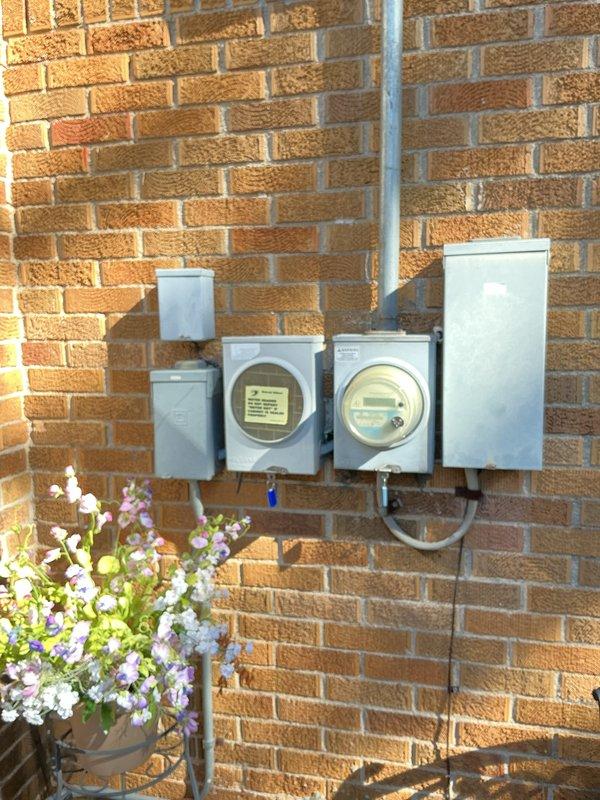 Completed on-site assessment for new whole home generator installation. Evaluated existing electrical service entrance with dual utility meters and main distribution panel, documented current 200-amp service configuration, and determined optimal generator placement and transfer switch requirements for seamless integration with existing electrical infrastructure.