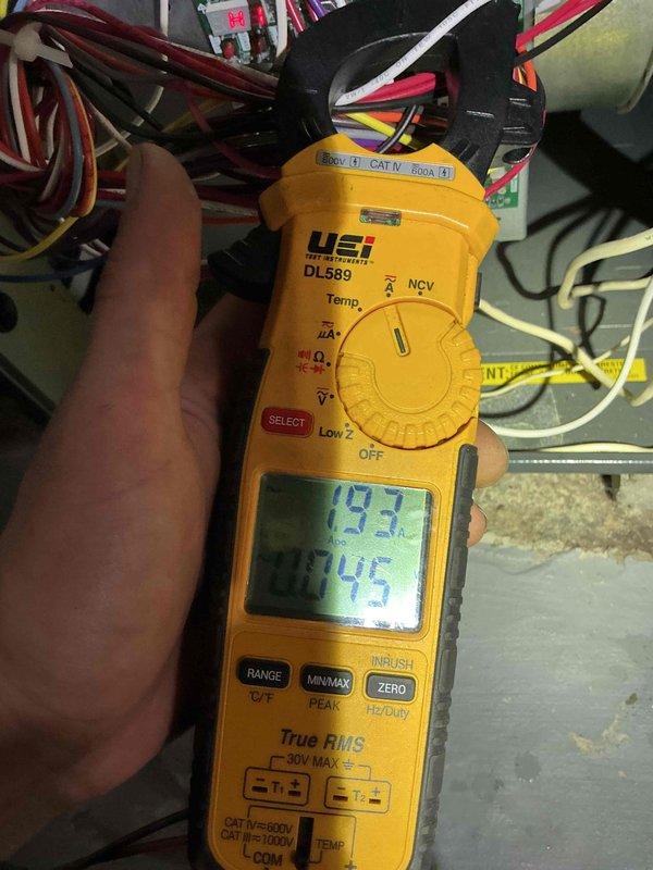 Completed comprehensive Gold Furnace Inspection on 2-year-old furnace system located in basement. Performed detailed diagnostic testing using digital multimeter to verify electrical readings and system voltages, measuring 193V and 345V across circuits to ensure proper power supply. Conducted combustion analysis and temperature differential measurements, recording supply temperature at 181.2°F with combustion efficiency at 95.1%, confirming unit is operating within manufacturer specifications and delivering optimal heating performance.