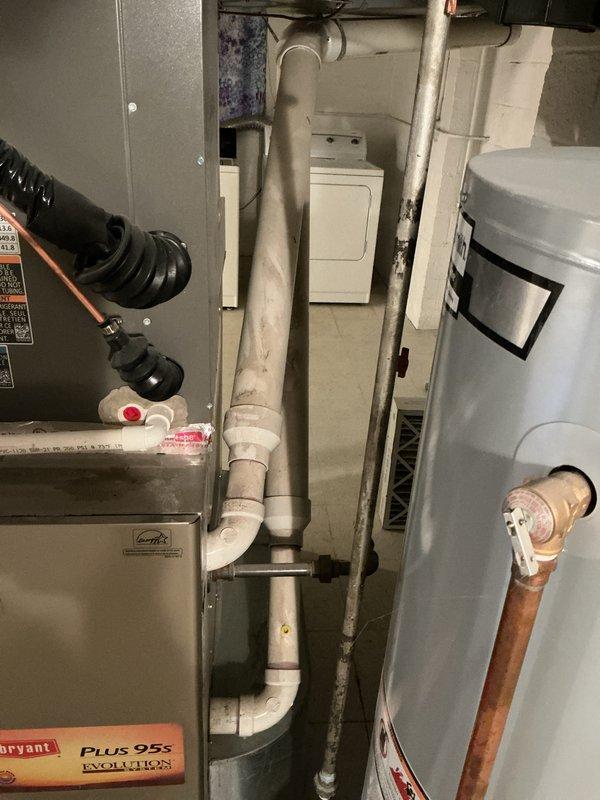 Responded to no heat complaint on 15-year-old Lennox 2-stage furnace located in basement. Upon inspection, confirmed unit was not producing heat and assessed overall system condition including existing Bryant PLUS 95s Evolution equipment visible in mechanical room. Evaluated furnace age, performance history, and current operational status. Provided comprehensive replacement estimate options for new high-efficiency furnace system to restore heating capability to the residence.