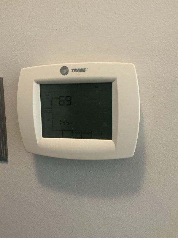 Completed comprehensive Gold-level furnace inspection on 10-year-old unit located in basement. Performed full system tune-up including burner assembly cleaning, heat exchanger inspection, blower motor lubrication, air filter evaluation, and combustion analysis to ensure safe and efficient operation. Verified thermostat functionality showing proper temperature control at 69°F setpoint, inspected all electrical connections, tested safety controls, and confirmed proper venting. All components found operating within manufacturer specifications with no deficiencies noted and system ready for continued service through the heating season.