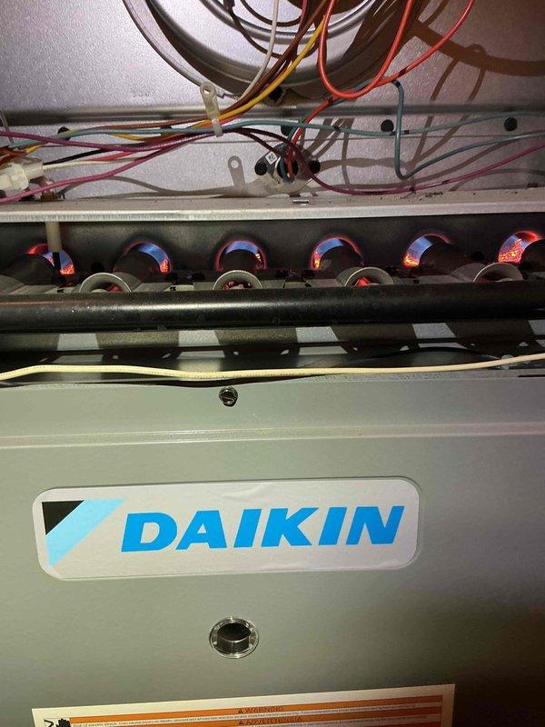 Completed Gold furnace inspection on 8-year-old Daikin forced air unit located in basement. Performed comprehensive system evaluation including visual inspection of internal components, electrical connections, and gas line connections. Verified proper operation of all safety controls and measured system performance parameters using diagnostic equipment. All components found to be functioning within normal operating specifications with no immediate service needs identified.