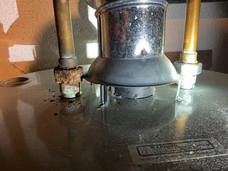 Replaced existing water heater due to significant corrosion around the dielectric fittings. Installed a 50-gallon Bradford White Defender Safety System standard tank water heater. Connected all copper supply lines and venting system to ensure proper operation and code compliance.