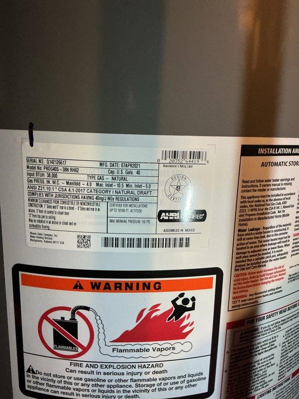 Completed comprehensive fall tune-up on 9-month-old York furnace system in basement. Performed full inspection of burner assembly, confirmed proper blue flame combustion pattern and efficient operation of gas valve controls. Corrected equipment records to reflect accurate installation date, verified all manufacturer specifications, inspected water heater safety labels and compliance markings, and provided additional air filter per customer request.