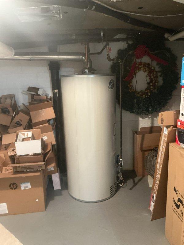 Completed Gold Furnace Inspection on Bryant forced-air heating system located in basement. Unit is under 10 years old and confirmed operational at time of service. Performed comprehensive inspection of furnace components, verified proper operation of all mechanical systems, examined ductwork and venting connections including PVC condensate drainage system, and documented equipment condition with photographs. All systems functioning as designed with no immediate service needs identified.
