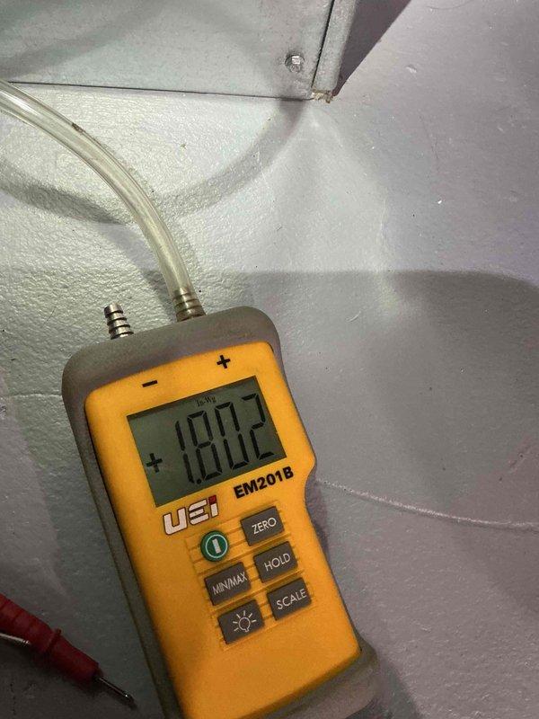 Completed comprehensive furnace inspection and tune-up on forced air heating system located in basement. System is less than 10 years old and operating within normal parameters. Performed visual inspection of all internal components including burner assembly, heat exchanger, gas valve, ignition system, and blower motor. All burner tubes showed proper flame characteristics with blue flame pattern indicating complete combustion. Verified gas connections and fittings for integrity; noted minor surface oxidation on some fittings which is typical for equipment age but does not affect operation. 

Inspected electrical components including control board, relays, and wiring connections. All connections secure with no signs of overheating or deterioration. Tested and verified proper operation of safety controls and limit switches. Blower motor assembly inspected and found in good working condition with normal operational sounds.

Conducted airflow measurements using manometer, recording static 