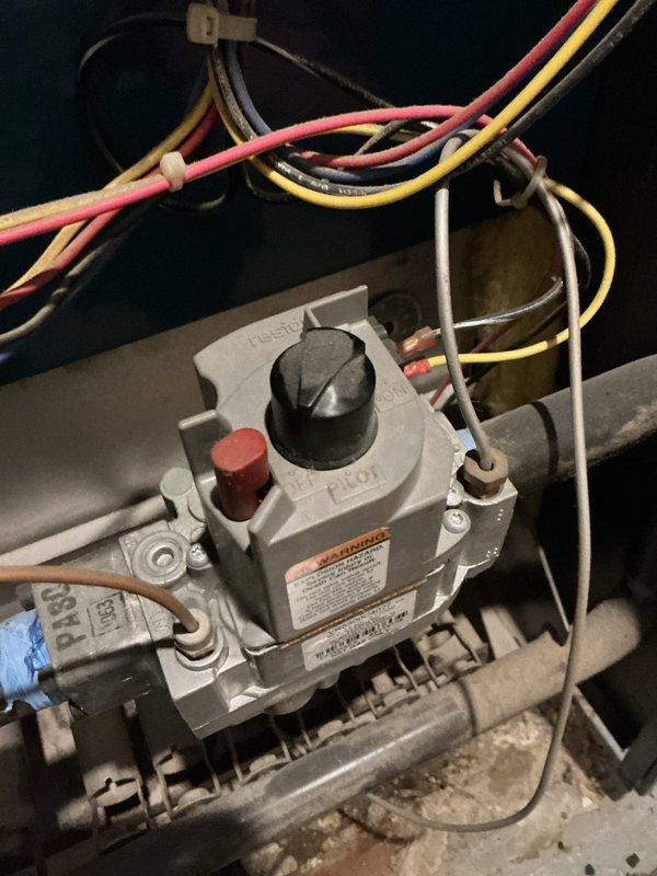 Responded to no heat call on 25-year-old Burnham 207NCL-GE12 boiler system. Upon arrival, inspected gas burner assembly and gas valve controls, documenting equipment condition with photos. Diagnosed system failure, discussed age-related concerns and repair versus replacement options with customer given the advanced age of the unit beyond its typical service life expectancy.