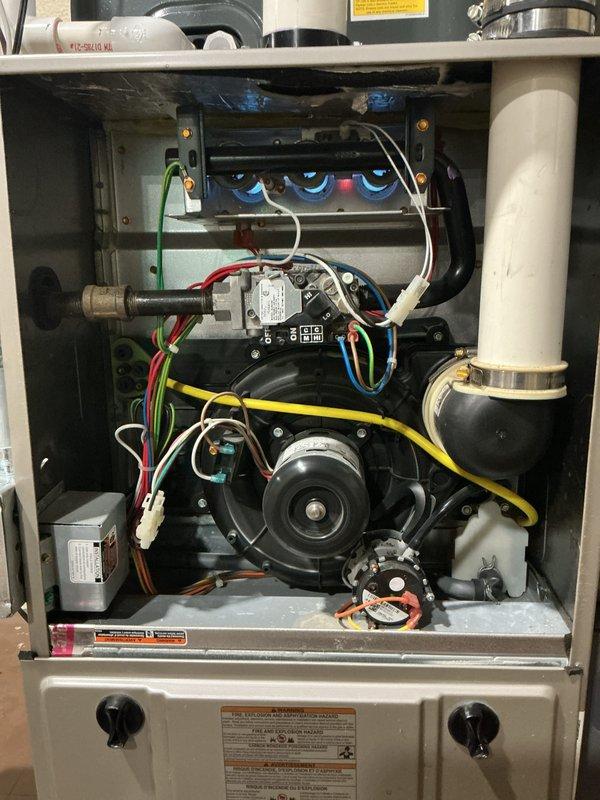 Completed comprehensive tune-up maintenance on two 8-year-old furnaces located in basement. Performed full system inspection including burner assembly, ignition components, gas valve operation, blower motor function, and electrical connections. Verified proper operation of flame sensors, pressure switches, and all safety controls. Inspected condensate drainage system and PVC venting for proper configuration. All components found to be in good working condition with no signs of corrosion or deterioration. Both units operating within manufacturer specifications and ready for heating season.