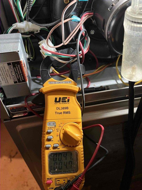 Responded to no heat call on 13-year-old Bryant 925SA42060E17A-A furnace. Upon arrival, confirmed thermostat display was functioning after battery replacement but furnace remained inoperative. Performed diagnostic testing on furnace system including electrical measurements with multimeter on blower motor circuits and wiring connections. Conducted combustion analysis using Bacharach analyzer, which showed acceptable readings: O₂ at 8.5%, CO at 35 ppm, efficiency at 96.2%, CO₂ at 7.0%, and stack temperature at 99°F. Traced issue to failed communication between Model 3002 thermostat and furnace control board. Verified all wire connections at thermostat and furnace terminal strip, finding intermittent connection on R-wire terminal causing loss of 24V signal to gas valve circuit. Cleaned and re-seated thermostat wiring connections, tested blower motor amperage and capacitor values within manufacturer specifications. Cycled system through multiple heating cycles to verify proper ignition seq