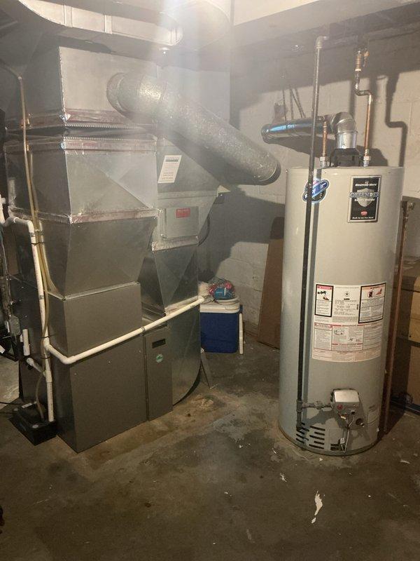 Completed annual heating maintenance and tune-up on a 13-year-old furnace located in the basement. Performed comprehensive inspection of all system components including heat exchanger, burner assembly, and blower motor. Checked and cleaned flame sensor, inspected gas connections for leaks, and verified proper combustion and venting. Tested thermostat operation and confirmed accurate temperature readings on Niagara ECOHD programmable unit. Measured and recorded temperature rise across heat exchanger within manufacturer specifications. Inspected and cleaned burners, checked ignition system functionality, and verified proper flame characteristics. Examined all electrical connections, tested safety controls including limit switches and rollout sensors. Checked blower motor operation, lubricated where applicable, and inspected belt condition and tension. Verified proper airflow through supply and return ductwork. Changed air filter and confirmed proper system cycling. Tested furnace through
