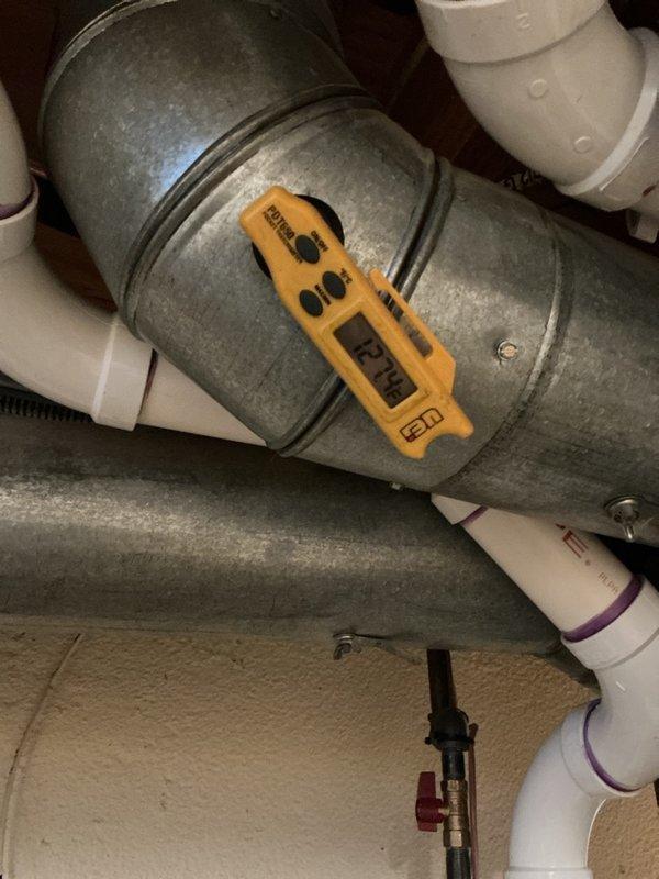 Completed comprehensive Gold-level preventative maintenance and tune-up on Lennox WT 10-2030 furnace system. Performed full system inspection with front access panel removal to evaluate internal components including blower motor assembly, electrical connections, and control boards. Conducted diagnostic testing of all mechanical and electrical systems, verified proper operation of blower motor and fan housing, and inspected wiring harness connections throughout unit. Measured and recorded temperature differential across heat exchanger, confirming system operating within manufacturer specifications at 02:44 reading. Examined furnace burner assembly, heat exchanger integrity, and combustion components for proper function and safety compliance. Verified gas pressure, inspected flue piping and PVC condensate drainage system for proper installation and flow. All safety controls, limit switches, and flame sensors tested and confirmed operational. System found to be in excellent condition cons