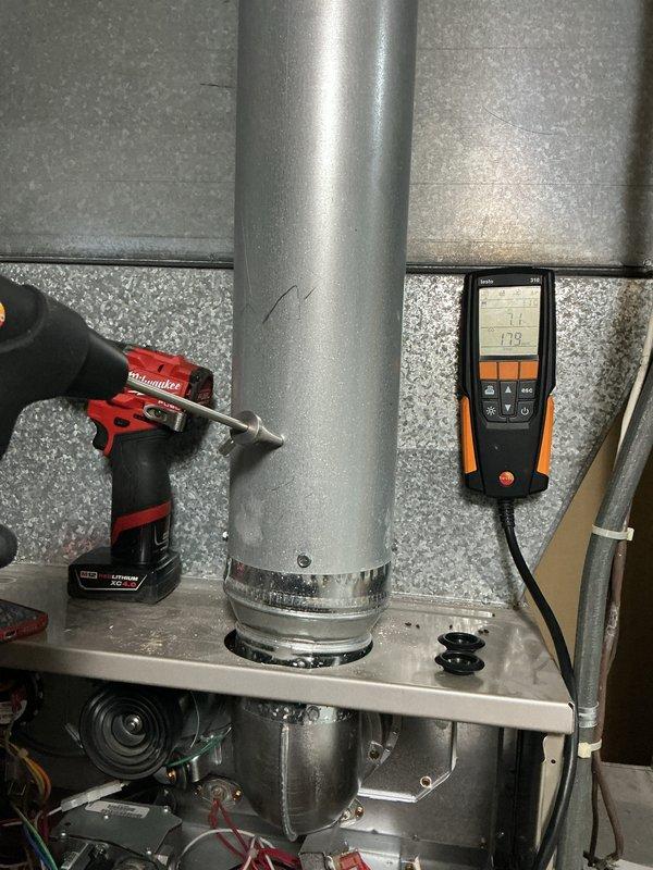 Completed comprehensive furnace tune-up and inspection on forced air heating system located in basement. Performed thorough diagnostic testing of all system components using digital multimeter to verify proper electrical operation and safety parameters. Inspected and serviced blower motor assembly, ductwork connections, and air handler unit. All mechanical components tested within manufacturer specifications and system operating efficiently at time of departure.