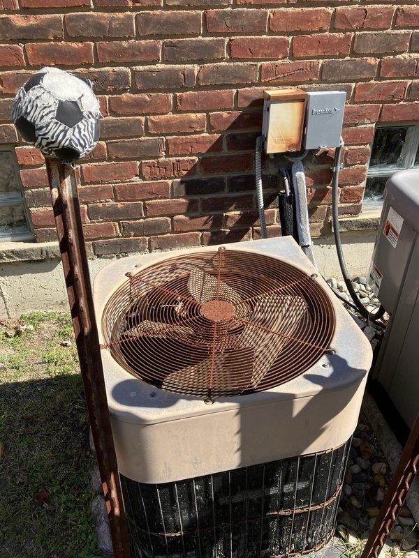 Completed free estimate for replacement of 25-year-old furnace located in basement and 25-year-old central air conditioning unit located outside. Photographed existing equipment including basement furnace with adjacent water heater and outdoor condenser unit with heavily rusted fan guard and weathered copper refrigerant lines. Customer also requested separate estimate for water heater replacement to be scheduled as plumbing service at later date.