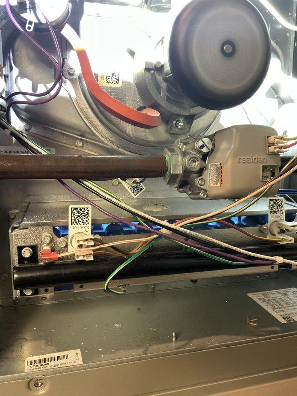 Completed comprehensive tune-up inspection on 1-year-old HVAC system located in basement. Performed thorough examination of heating unit internal components, including Resideo control valve, wiring connections, and mechanical assemblies. Conducted combustion analysis testing using digital analyzer to verify proper system operation and efficiency, with all temperature and O2 readings within normal parameters. Inspected and evaluated humidifier, thermostat functionality, and hot water tank as part of complete system assessment. All components found to be operating properly with wiring secured and organized throughout the unit.