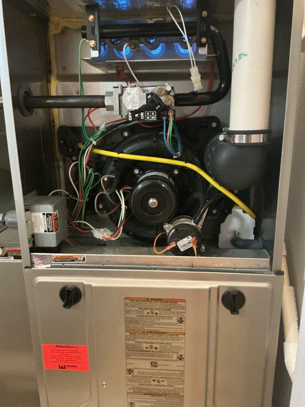 Completed comprehensive Gold-level preventative maintenance inspection on two gas furnaces in preparation for heating season. Basement unit: 10-year-old Bryant gas furnace underwent full tune-up including burner assembly inspection and cleaning, flame sensor cleaning, blower motor and capacitor testing, air filter replacement, thermostat calibration verification, and combustion analysis to ensure proper gas-to-air mixture and efficient operation. Verified all electrical connections, tested safety controls including limit switches and rollout sensors, and confirmed proper venting. Second-floor unit: 12-year-old furnace received identical comprehensive service protocol. Both units demonstrated proper ignition sequence with consistent blue flame patterns across all burner ports. Blower assemblies on both systems operating within manufacturer specifications with adequate amperage draw. All safety devices tested and functioning correctly. Condensate drainage systems inspected and confirmed 