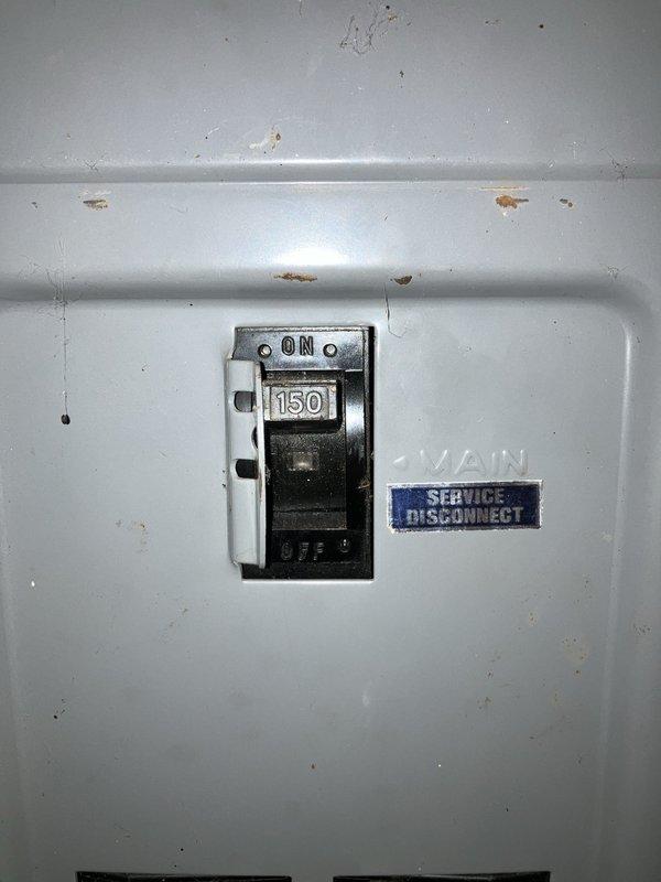 Conducted on-site evaluation for new whole home generator installation at residential property. Assessed existing electrical service infrastructure including 150-amp main service disconnect and utility meter location on exterior brick wall. Documented current electrical panel configuration, gas meter proximity, and available installation space along building exterior. Evaluated site conditions including landscaping clearances, access requirements, and proper positioning for generator placement in accordance with manufacturer specifications and local code requirements.