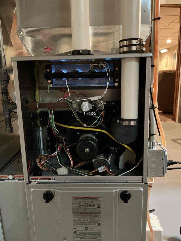 Performed comprehensive maintenance inspection on 22kW Generac standby generator as part of complimentary first-year service following installation. Conducted visual inspection of generator cabinet and internal components, verified proper operation of all control systems, and checked battery condition and charging system functionality. Inspected oil level and quality, examined air filter condition, and verified coolant levels in the engine cooling system. Tested automatic transfer switch operation and confirmed proper voltage output under simulated load conditions. Checked all electrical connections for tightness and signs of corrosion, inspected wiring harnesses and terminal blocks, and verified proper grounding. Examined exhaust system for leaks or deterioration and confirmed adequate ventilation clearances around unit. Reviewed control panel display for error codes or system alerts and documented run hours on the unit. All systems found to be operating within manufacturer specificat