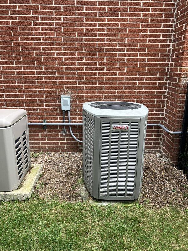 Completed annual heating maintenance and tune-up on a 19-year-old Lennox HVAC system. System was operating properly upon arrival. Performed comprehensive inspection of outdoor condenser unit, refrigerant lines, and electrical disconnect. All components found in good working condition with clean exterior surfaces and proper insulation on refrigerant lines.