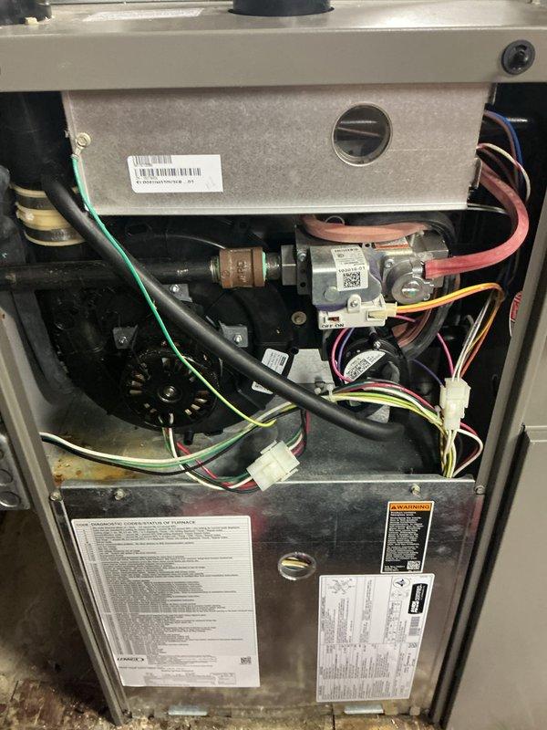 Completed comprehensive Gold Furnace Inspection on two basement-located furnace units, both approximately one year old and operational at time of service. Performed thorough examination of internal mechanical and electrical components including gas valve assemblies, blower motors, ignition systems, control boards, and wiring harnesses. Inspected burner assembly, heat exchanger accessibility, and all safety controls. Verified proper gas connections, electrical connections, and component mounting. Documented equipment condition through photographic inspection showing normal operational wear consistent with age of units.