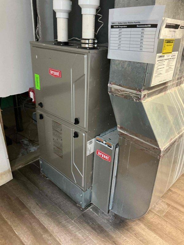 Completed comprehensive tune-up on 7-year-old Bryant gas furnace located in basement. Performed visual inspection of burner assembly, heat exchanger, and gas valve components while unit was operational, confirmed proper ignition sequence and blue flame pattern across all burner ports. Verified all electrical connections, tested safety controls, and ensured exhaust and intake PVC venting systems were properly secured and functioning correctly.