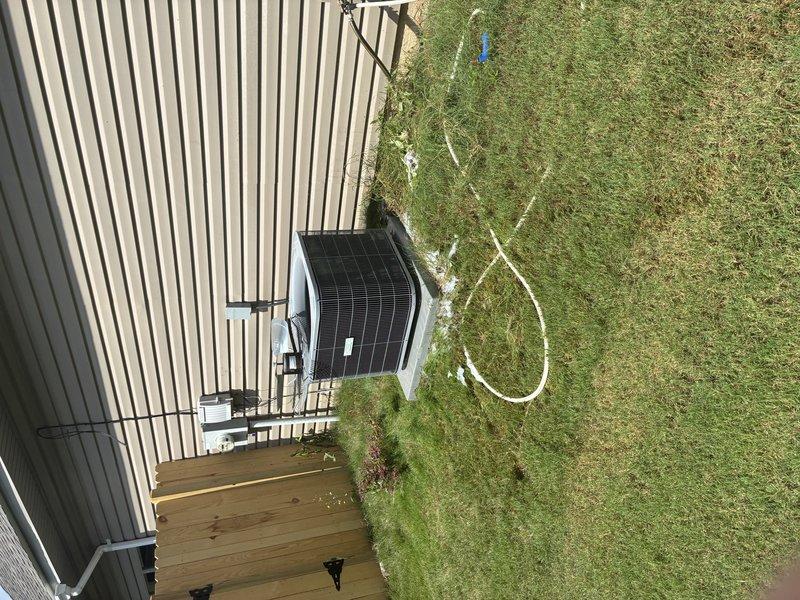 Completed routine service agreement maintenance visit on a residential HVAC system. Performed comprehensive inspection of both indoor and outdoor components, including examination of the compressor assembly, refrigerant lines, electrical connections, and motor unit within the air handler compartment. Verified proper operation of all mechanical components, checked refrigerant line connections for integrity, and inspected the outdoor condensing unit positioned on the concrete pad. All components found to be in operational condition with no immediate service needs identified. Documentation captured showing system configuration and component condition for service records.