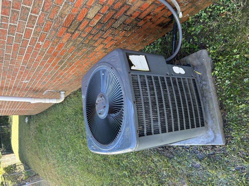 Performed scheduled maintenance inspection on the gas furnace and outdoor air conditioning condenser. Inspected the burner assembly, gas valve, supply piping, flame sensor/igniter, and wiring, and observed normal flame characteristics with some dust and discoloration noted on the burner area. Inspected the condenser unit, line set, conduit, and condensate drain, noting general weathering, dirt buildup, a peeling top label, and a slightly tilted, stained concrete pad.