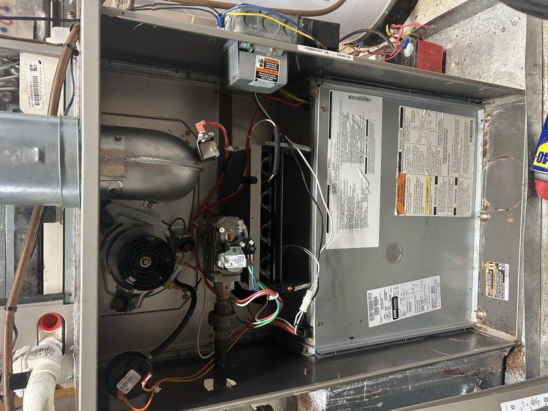Performed a scheduled maintenance inspection on the gas furnace, including verification of the flame sensor/igniter gap and positioning, and inspection of the inducer assembly, gas valve, pressure switch tubing, and wiring connections. Lubricated applicable components and noted light surface corrosion and debris within the cabinet, which should be monitored at future visits.