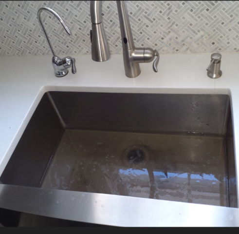 Washington, DC - Snake machine/fixture drain service in kitchen sink 