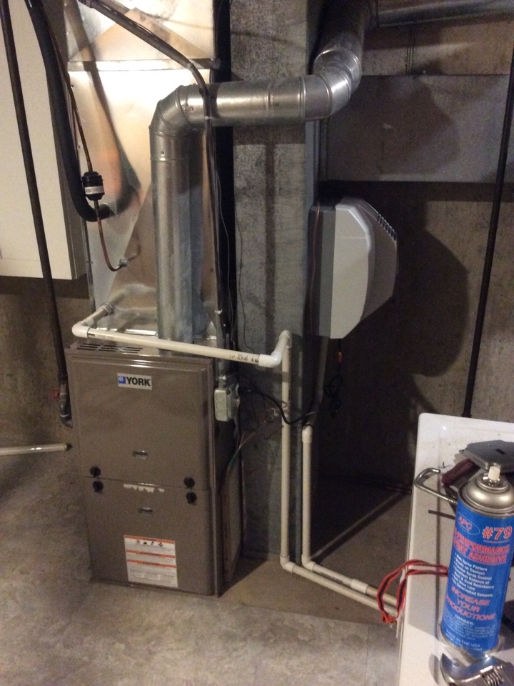 Furnace cleaning and humidifier installation