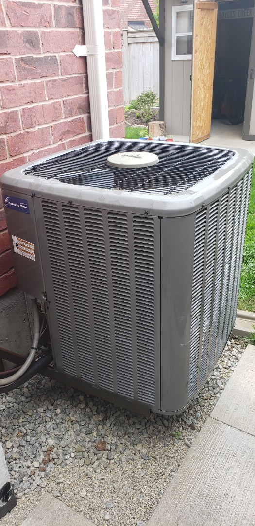 Performing yearly maintenance on a Whirlpool 3 ton air conditioner in Caledon East. 