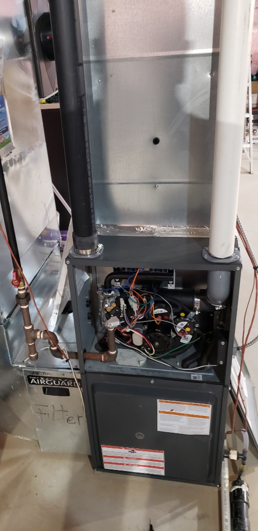 Performing yearly maintenance on a Goodman furnace in Niagara on the Lake 