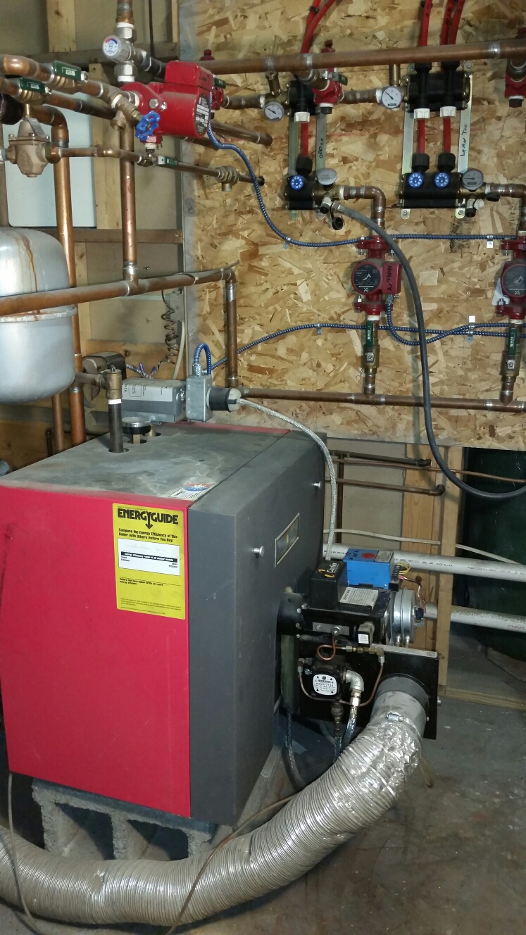 Planned maintenance on oil fired direct vent Crown boiler.