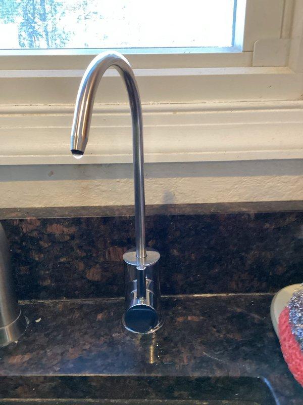 Successfully installed new GE under-sink water filtration system in kitchen after removing previous broken unit. Completed all necessary plumbing connections with proper fittings and ensured leak-free operation of the system and faucet.