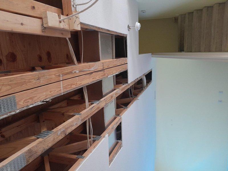 Successfully completed ductwork modification to accommodate new plumbing installation by removing a section of existing duct board, creating necessary clearance for the 3" main duct run. Installed insulated metal ductwork in place of the removed section and properly reconnected the entire system to ensure proper airflow and system integrity.