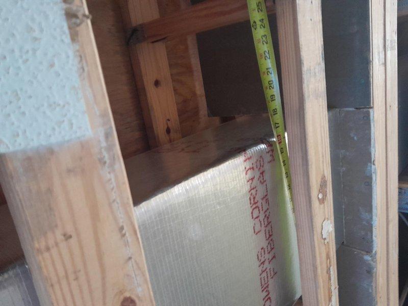 Successfully completed ductwork modification to accommodate new plumbing installation by removing a section of existing duct board, creating necessary clearance for the 3" main duct run. Installed insulated metal ductwork in place of the removed section and properly reconnected the entire system to ensure proper airflow and system integrity.