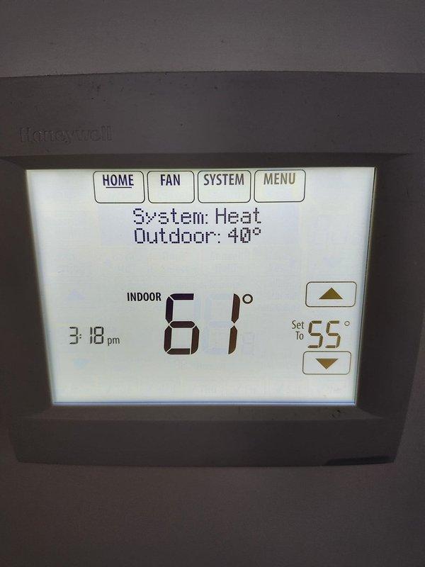 Performed annual heating system tune-up and safety inspection. System operating with 90.1% efficiency, combustion analysis showed normal CO levels (1 ppm) with proper O₂ (7.3%) and CO₂ (9.0%) readings. Thermostat was functioning correctly with proper heat staging; recommended maintaining current settings for optimal efficiency.