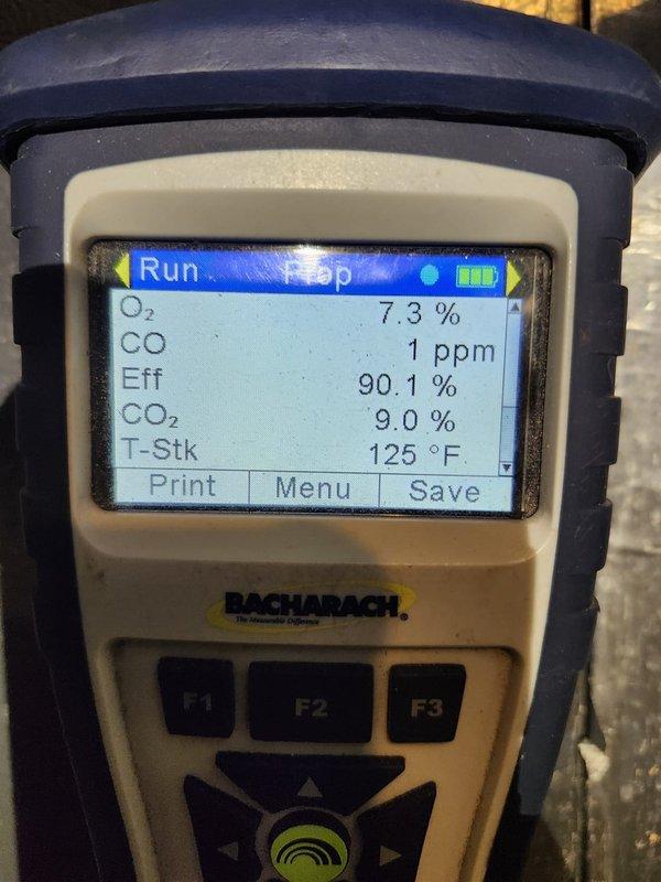 Performed annual heating system tune-up and safety inspection. System operating with 90.1% efficiency, combustion analysis showed normal CO levels (1 ppm) with proper O₂ (7.3%) and CO₂ (9.0%) readings. Thermostat was functioning correctly with proper heat staging; recommended maintaining current settings for optimal efficiency.