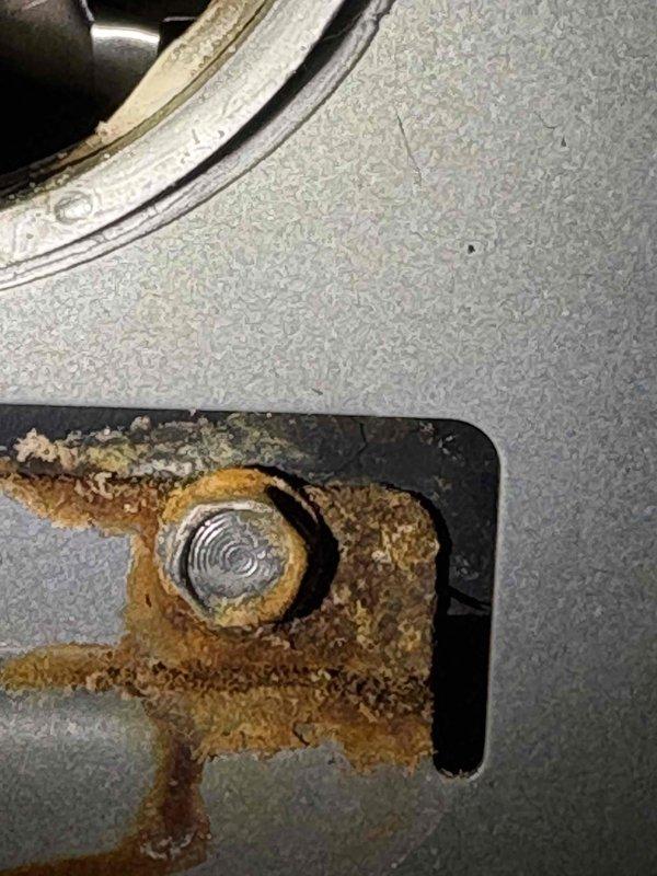 Responded to no-heat service call for 10+ year old system. Inspection revealed severe corrosion and rust damage on critical heat exchanger components. Documented extensive deterioration of metal brackets and housing with photographic evidence. System deemed unsafe for continued operation due to advanced oxidation that presents potential carbon monoxide hazard. Recommended complete system replacement as repair not economically viable given age and condition.