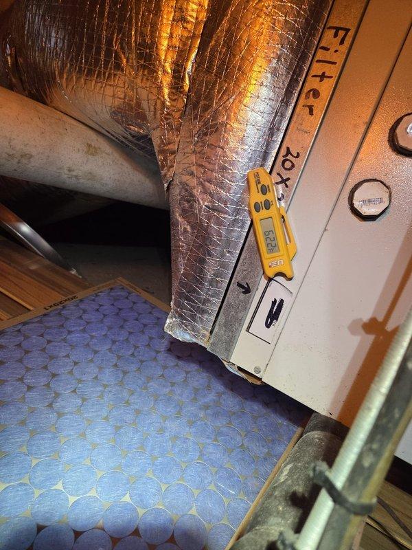 Performed heating maintenance on dual systems. Verified proper operation of Honeywell ProSeries thermostat (current temp 69°F, set point 66°F) and provided client with operational instructions as requested. Inspected ductwork insulation and filter compartment, with temperature readings recorded at measurement points.