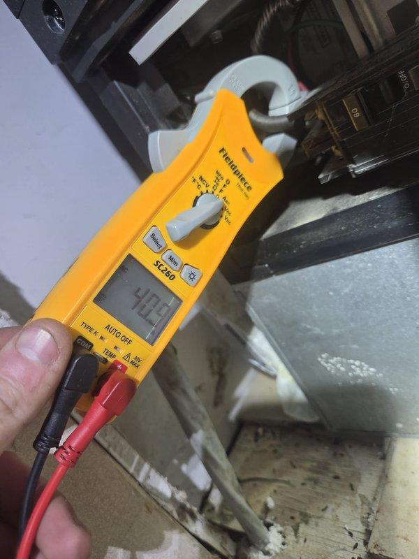 Performed scheduled heating maintenance visit. Checked thermostat operation, confirming proper function with system maintaining set temperature at 55°F. Conducted electrical diagnostics using clamp meter, measuring 40.2 amps through system components. All heating elements functioning within normal parameters.