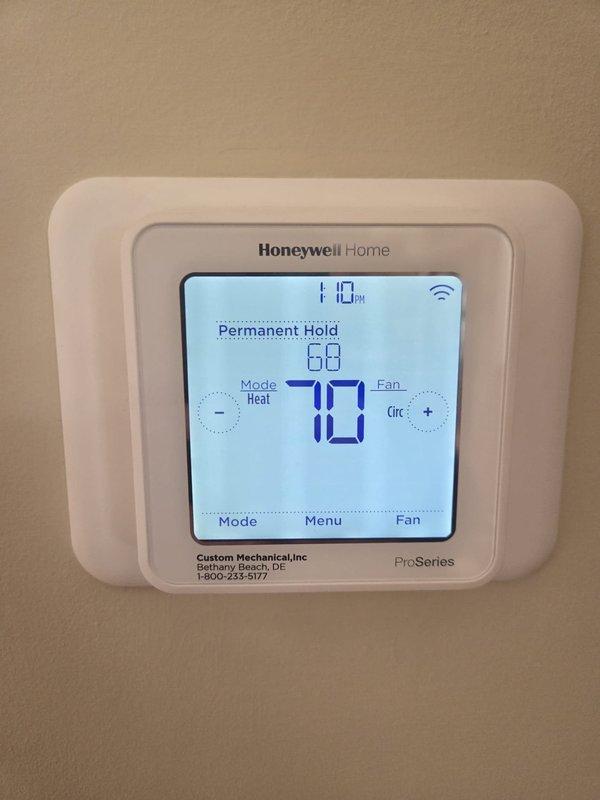 Performed heating system inspection and maintenance visit. Verified thermostat operation (Honeywell ProSeries) set to 68°F with circulation mode active. Conducted temperature differential testing with readings of 41.5°F, confirming proper system performance within manufacturer specifications.