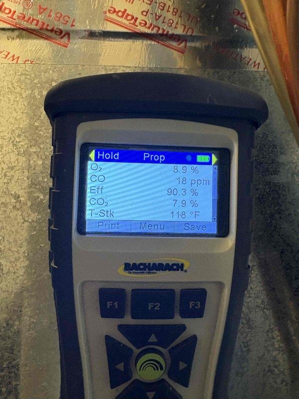 Performed scheduled preventative maintenance on heating system. Discovered severely corroded burners which were replaced. Conducted combustion analysis with Bacharach analyzer showing 90.3% efficiency, 18ppm CO, and normal stack temperatures, confirming system now operating within manufacturer specifications.