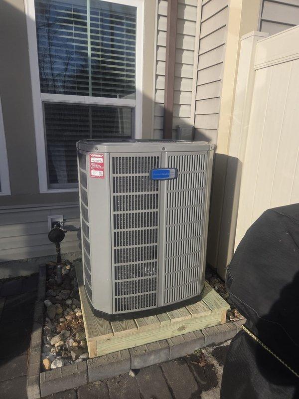 Successfully removed old system and installed a complete American Standard heat pump system consisting of a 2-ton 17 SEER Two Stage Heat Pump (5A6H7024A1000), Variable Speed Air Handler (5TEM6B03AV21), and 10kw Electric Heat Pack (BAYHTR1510). Adapted existing ductwork with metal transitions, replaced outdoor disconnect and electrical whip, and mounted outdoor unit on a pressure-treated wood platform with proper connections to existing electrical, condensation, and power lines.