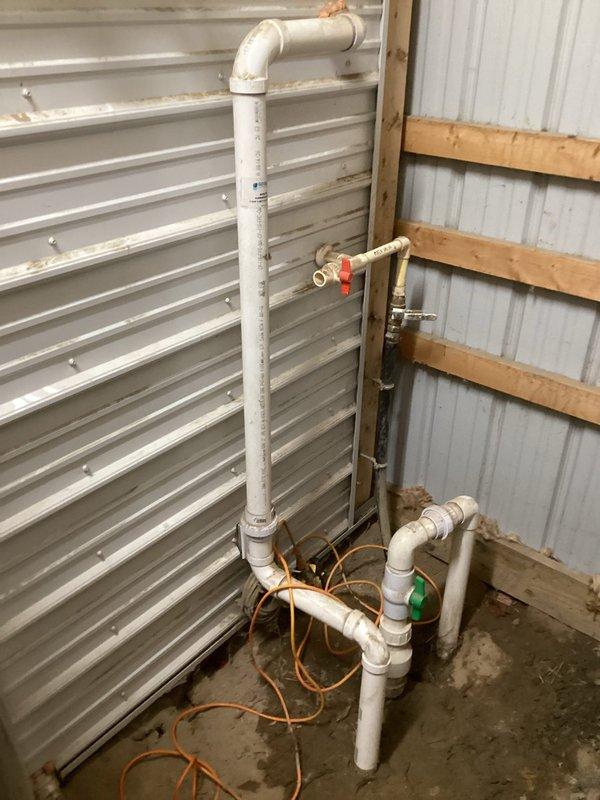 Responded to emergency call for no water service. Diagnosed cracked 1" brass tee in barn area necessitating complete water shutoff. Successfully replaced damaged fitting, restoring water supply for livestock. System tested and confirmed operational with proper pressure.