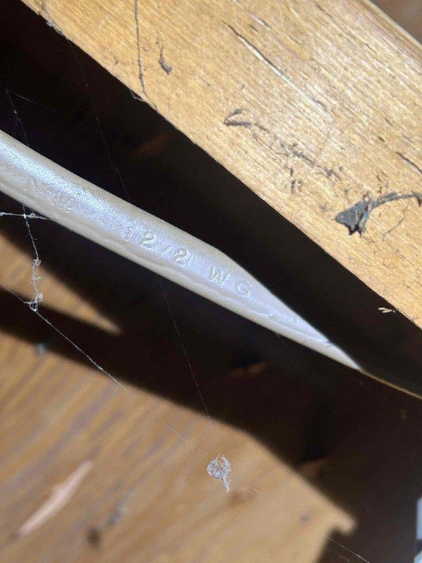 Responded to no heat call for upstairs system. Inspected furnace located in crawl space/attic area. Found refrigerant leak in condensate drain line (PVC pipe) connected to unit. Repaired leak, added refrigerant to proper level, and verified system operation. Previous refrigerant and dye addition from summer service helped identify leak location. System now functioning properly.