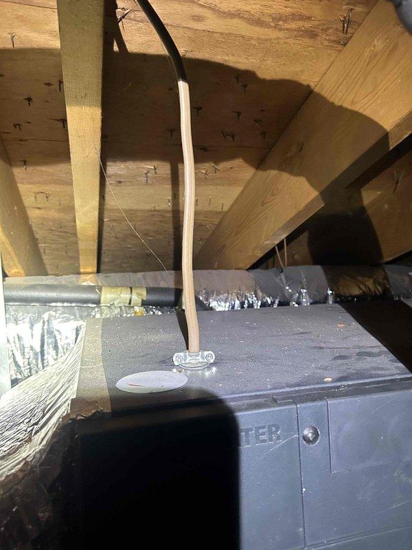 Responded to no heat call for upstairs system. Inspected furnace located in crawl space/attic area. Found refrigerant leak in condensate drain line (PVC pipe) connected to unit. Repaired leak, added refrigerant to proper level, and verified system operation. Previous refrigerant and dye addition from summer service helped identify leak location. System now functioning properly.